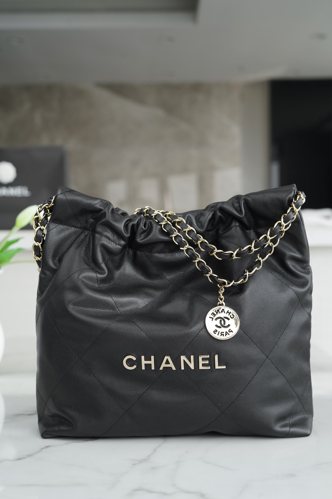 CHANEL 22P Handbag Black and Gold Caviar Leather  