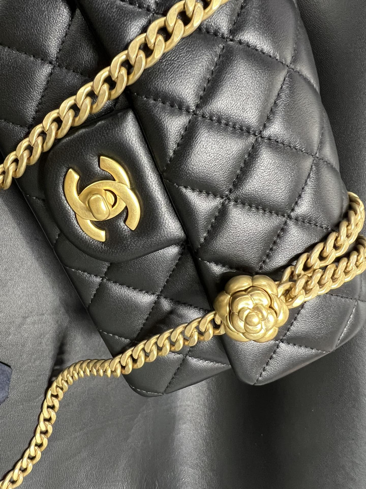 Chanel 23S Camellia Adjustable CF Large Mini, Black and Gold, Lambskin