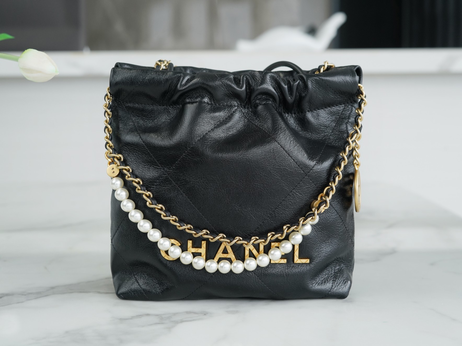 Chanel 23S 22Mini Pearl Chain Bag, Black, Wrinkled Calfskin