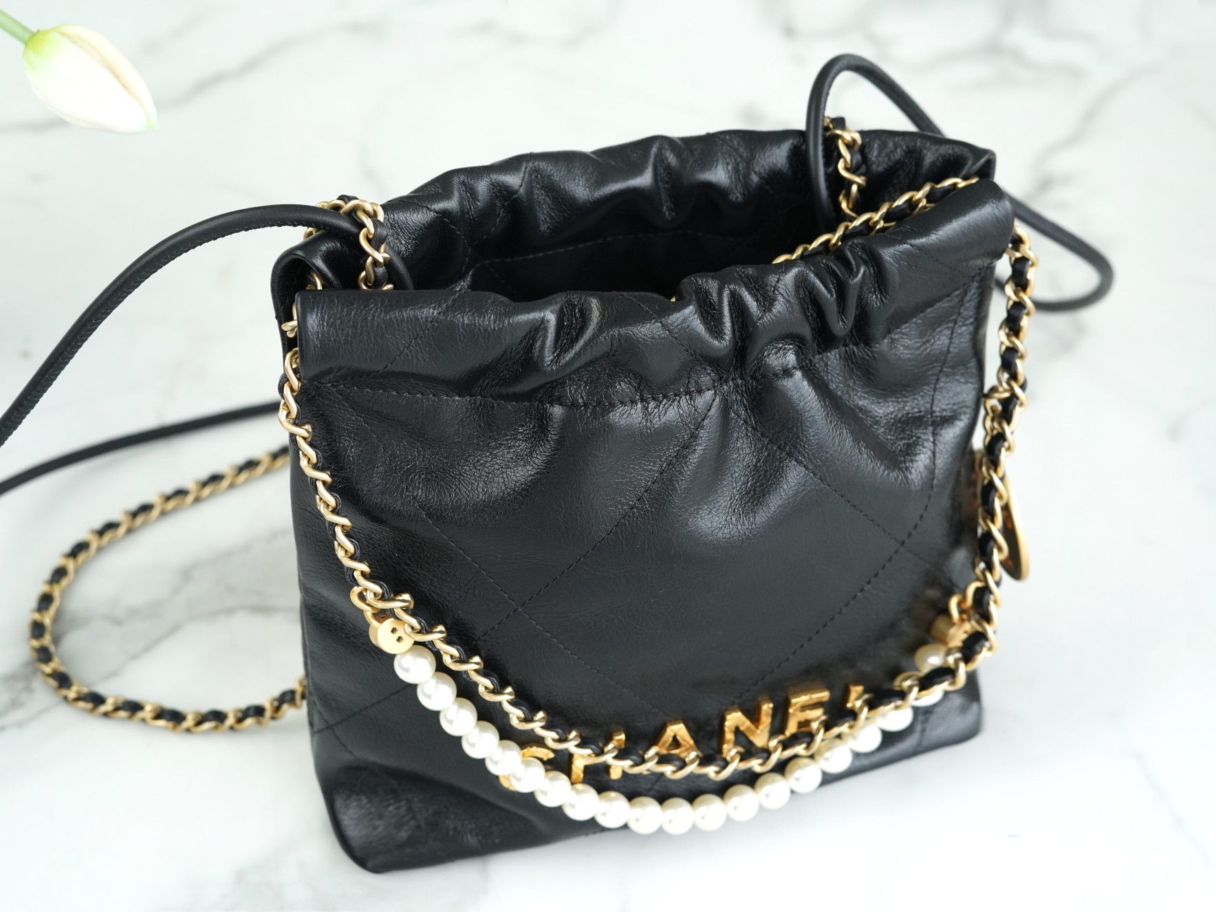 Chanel 23S 22Mini Pearl Chain Bag, Black, Wrinkled Calfskin