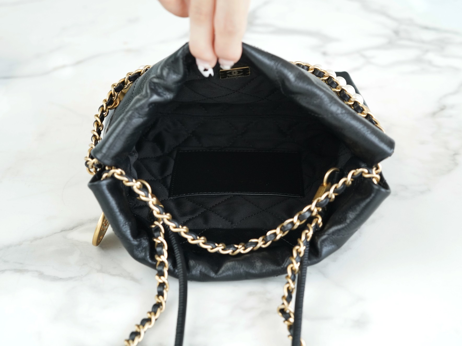 Chanel 23S 22Mini Pearl Chain Bag, Black, Wrinkled Calfskin