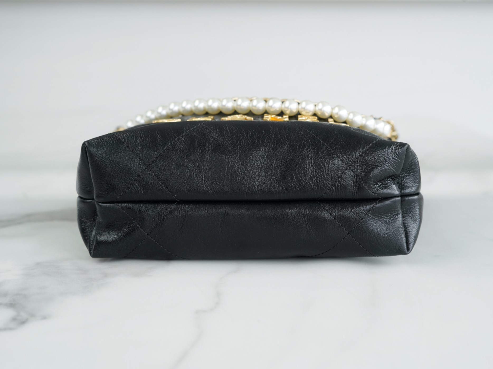 Chanel 23S 22Mini Pearl Chain Bag, Black, Wrinkled Calfskin