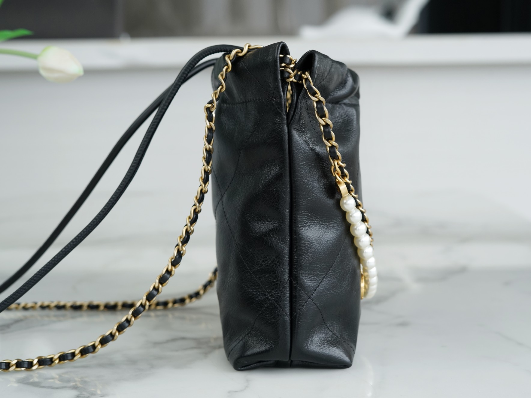 Chanel 23S 22Mini Pearl Chain Bag, Black, Wrinkled Calfskin