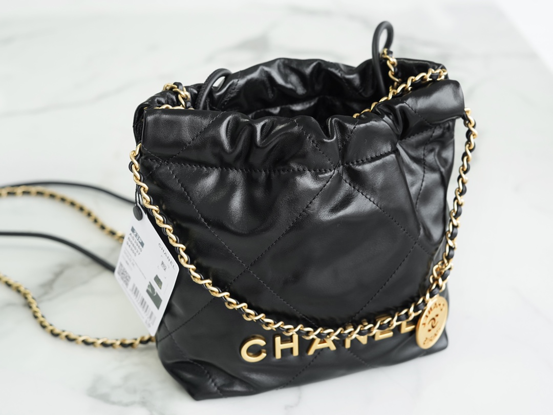 Chanel 23A 22 Mini Bag, Black and Gold, Calfskin