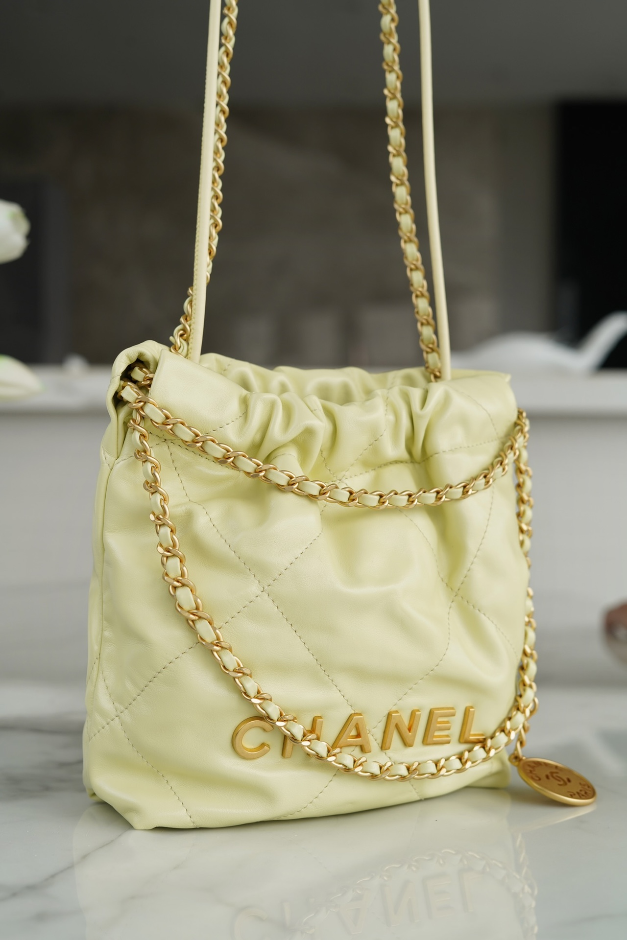 Chanel 23S 22 Mini Bag Chick Yellow Calfskin