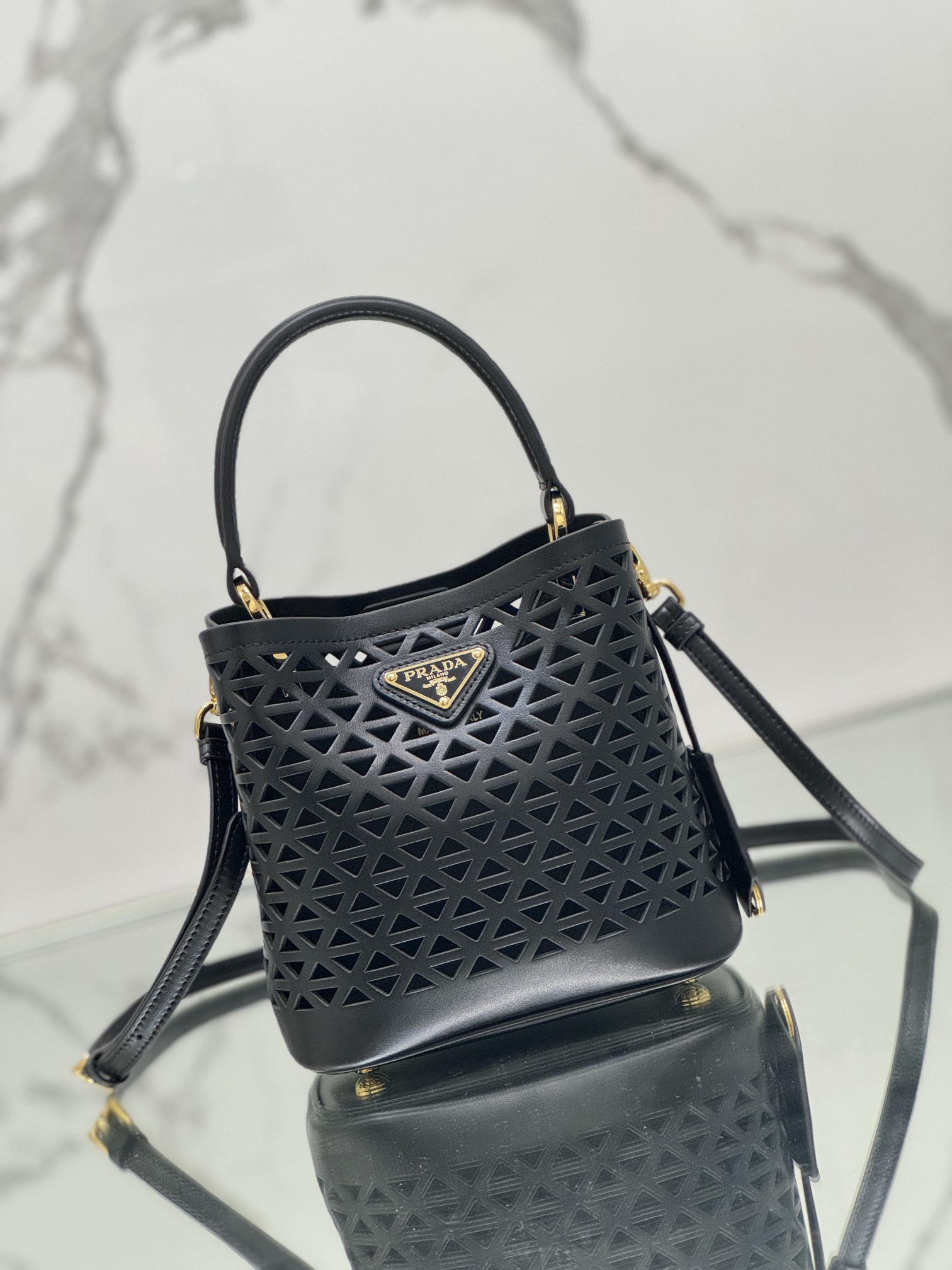 Hollow Barrel Bag "Elf" Saffiano Perforated Calfskin, Style No: 1BA217