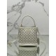 Hollow Barrel Bag "Elf" Saffiano Perforated Calfskin, Style No: 1BA217