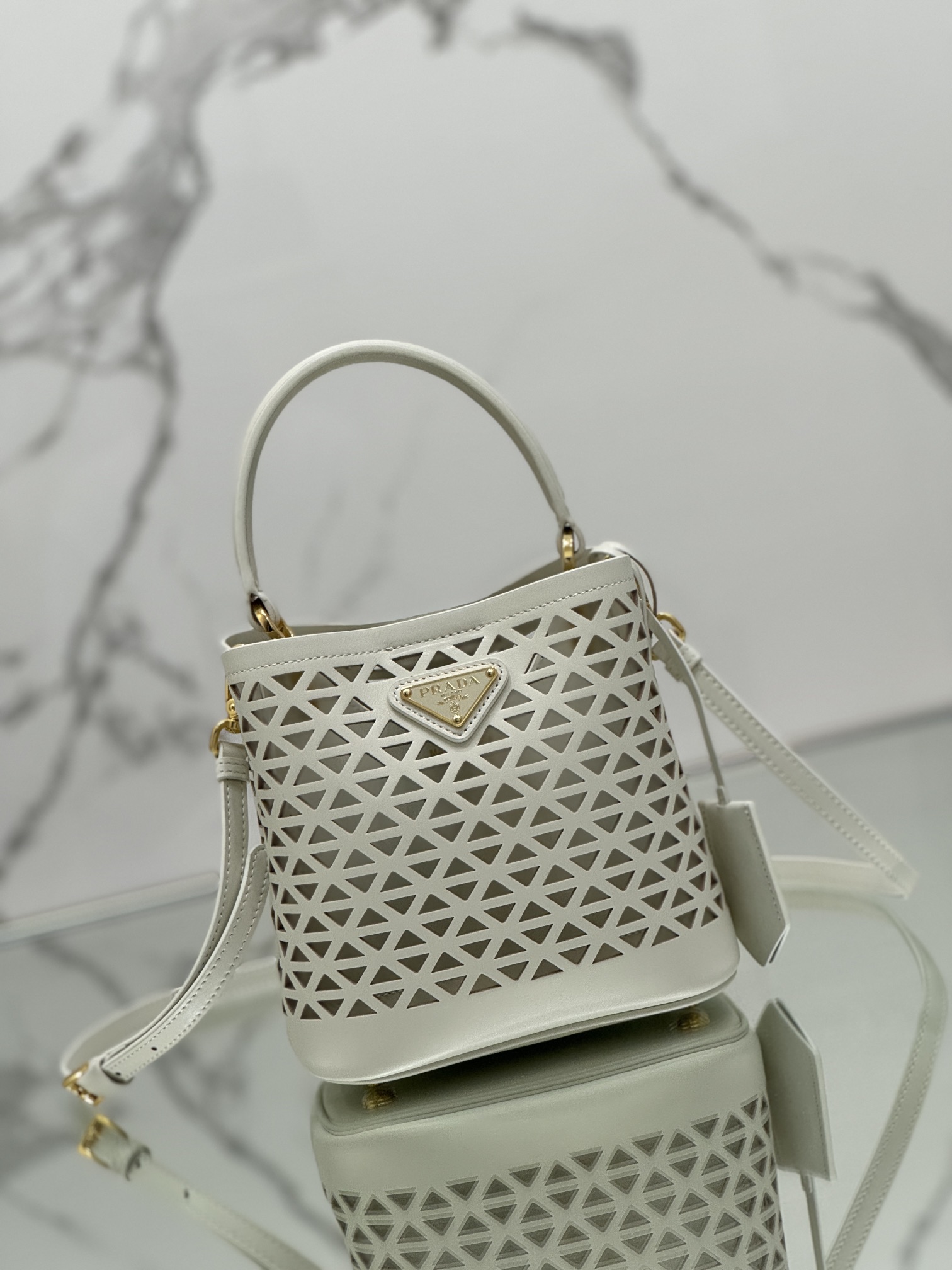 Hollow Barrel Bag "Elf" Saffiano Perforated Calfskin, Style No: 1BA217