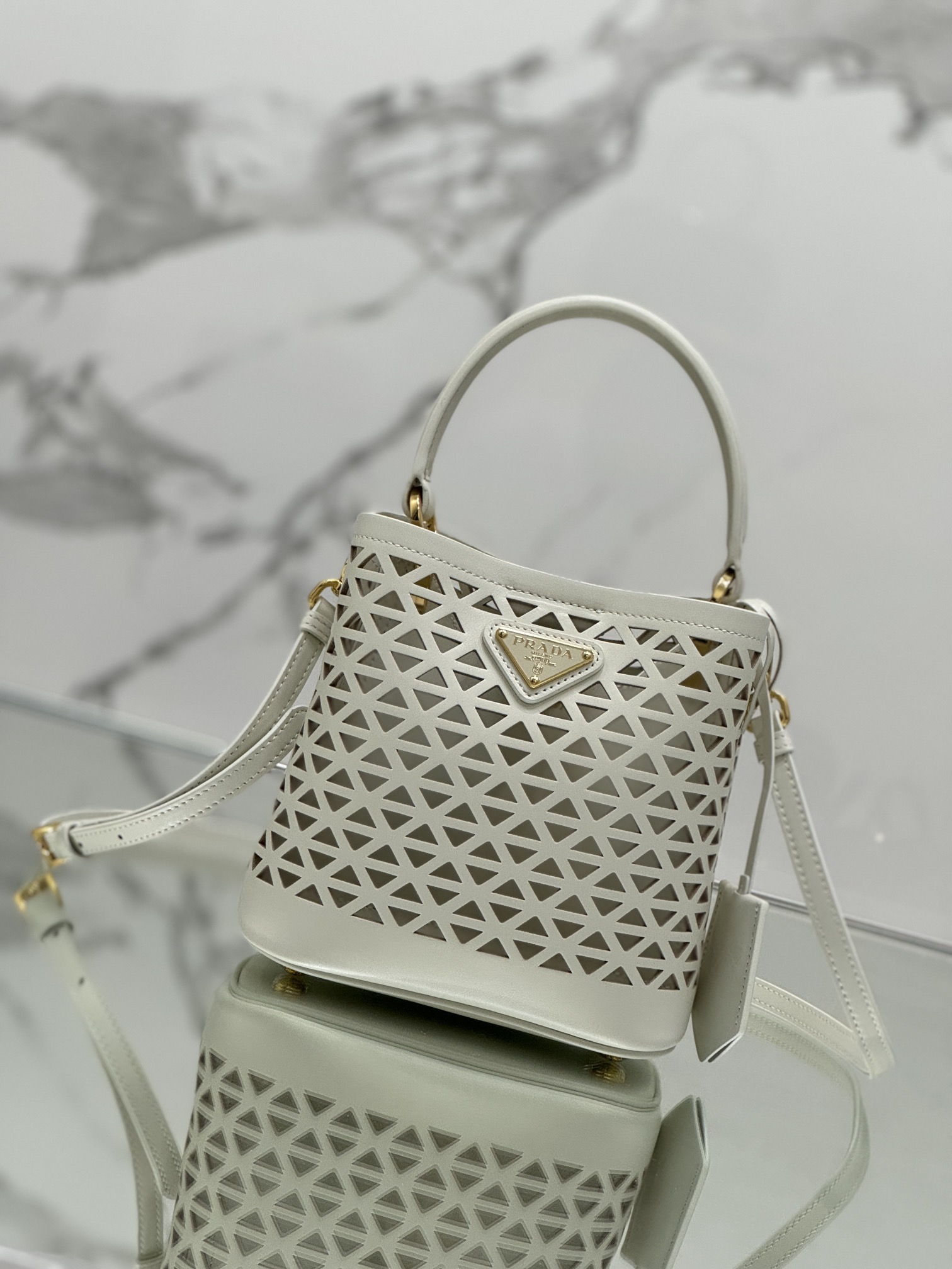 Hollow Barrel Bag "Elf" Saffiano Perforated Calfskin, Style No: 1BA217