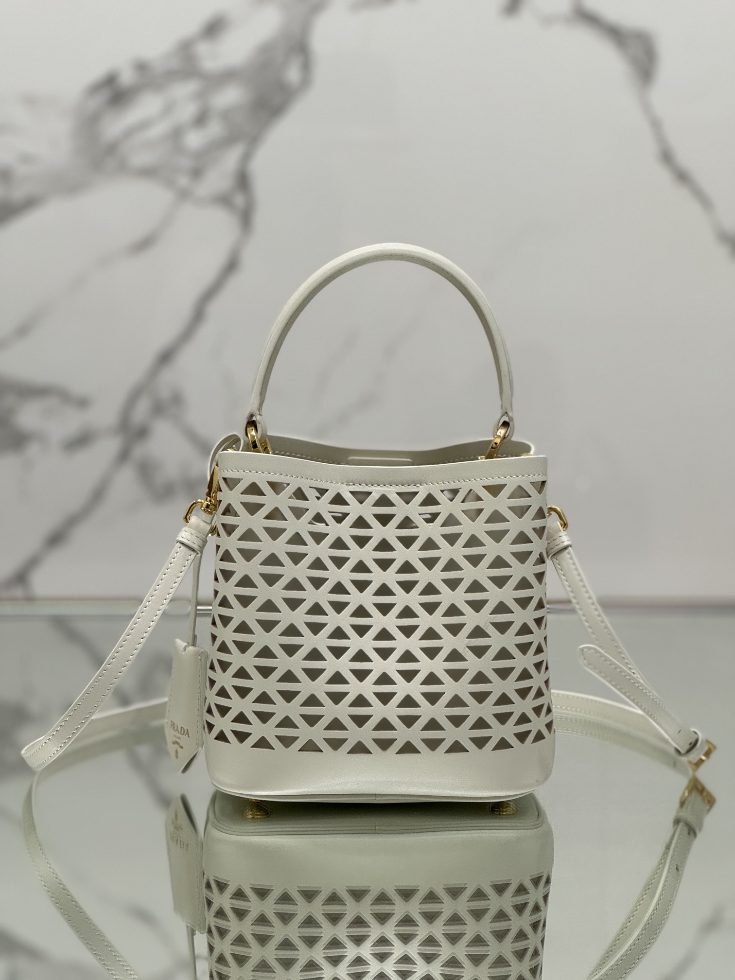 Hollow Barrel Bag "Elf" Saffiano Perforated Calfskin, Style No: 1BA217