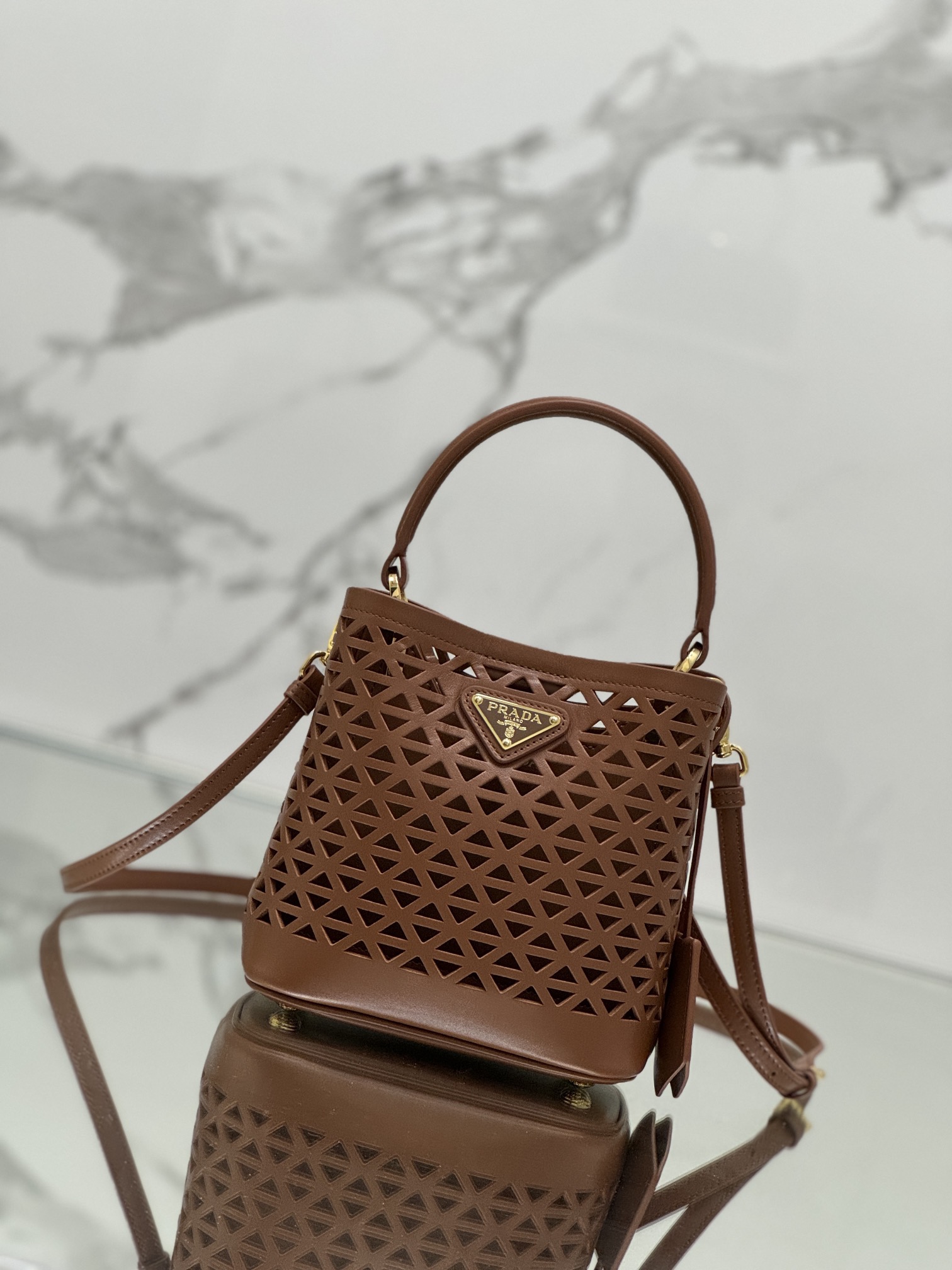 Hollow Barrel Bag "Elf" Saffiano Perforated Calfskin, Style No: 1BA217