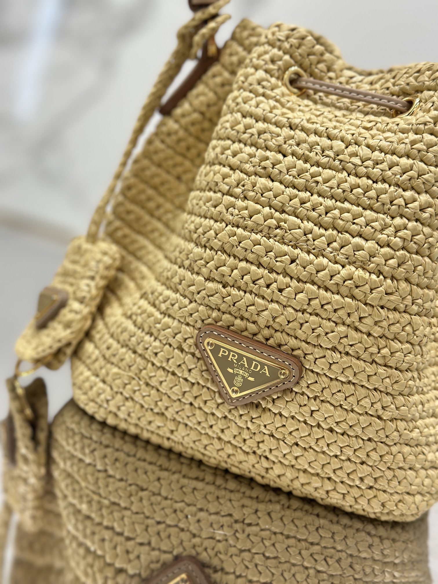 Woven Drawstring Bucket Bag Raffia Weave, Style Number: 1BE068