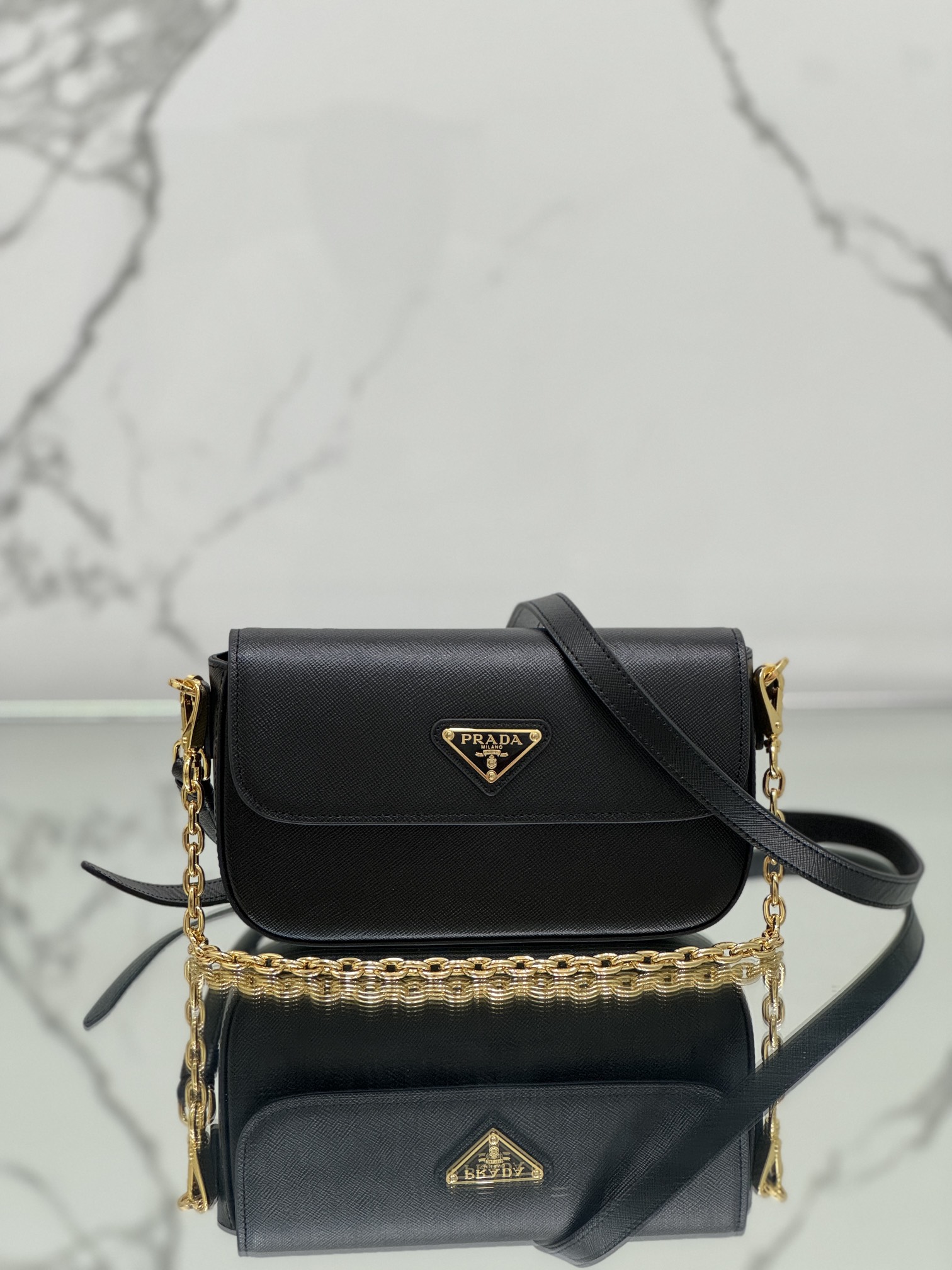 New chain crossbody bag, made of Saffiano leather with lamb leather interior, Model No: 1BD356  