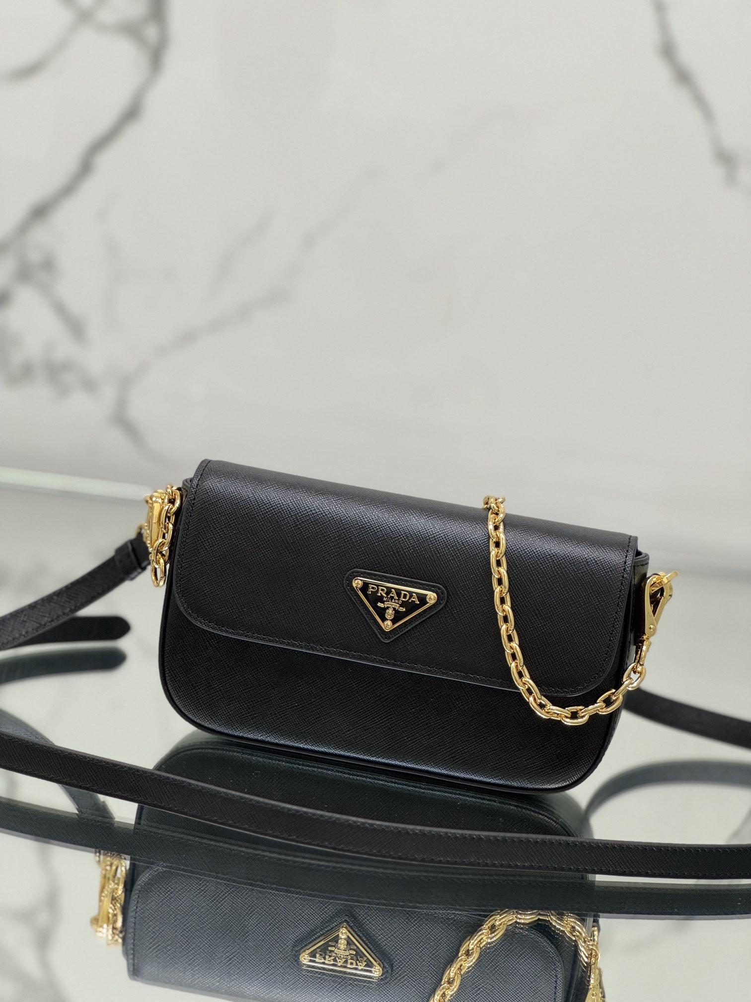 New chain crossbody bag, made of Saffiano leather with lamb leather interior, Model No: 1BD356  