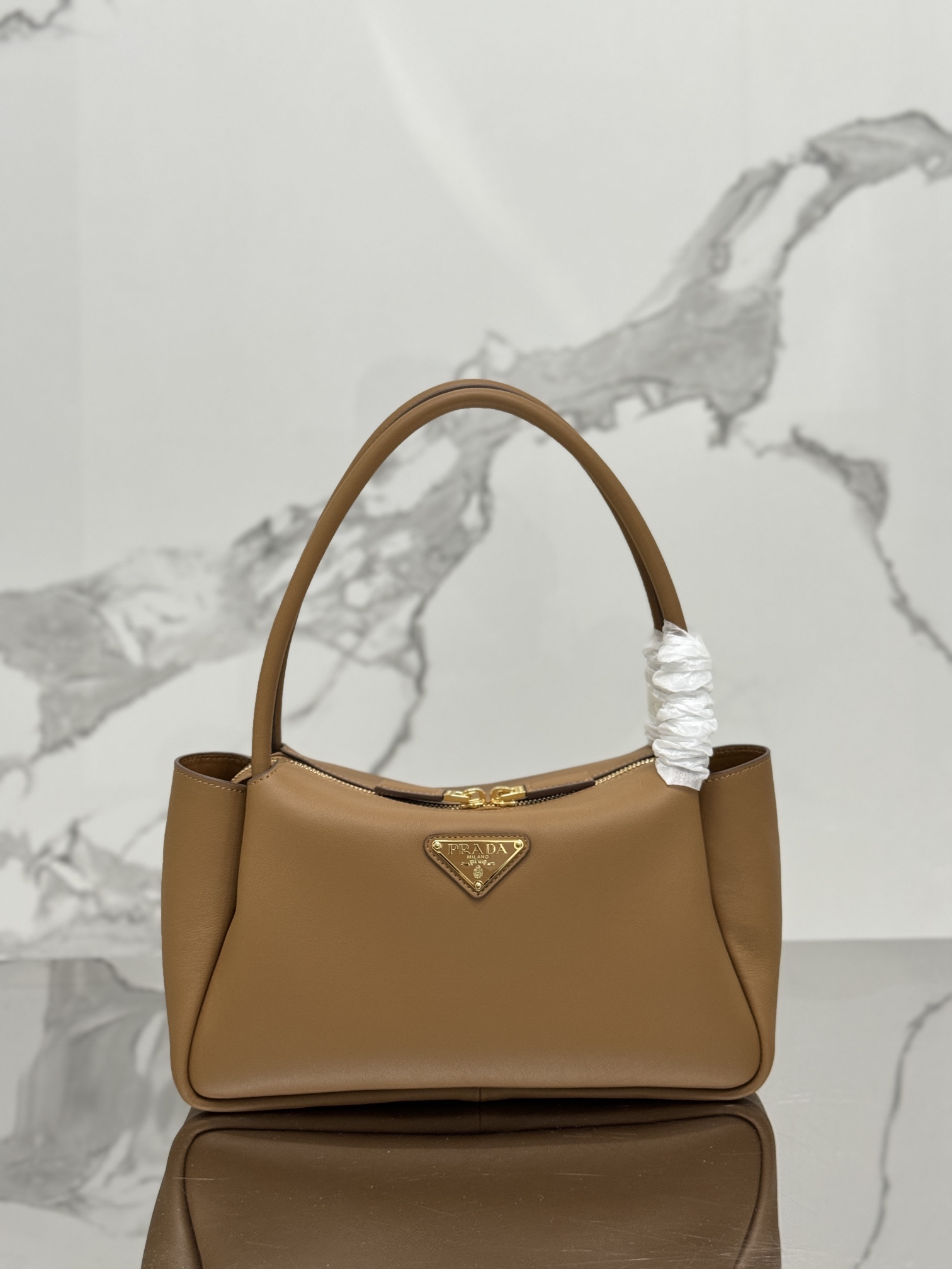 Leather handbag, imported calf leather, with imported lamb leather interior. Model No: 1BA444  