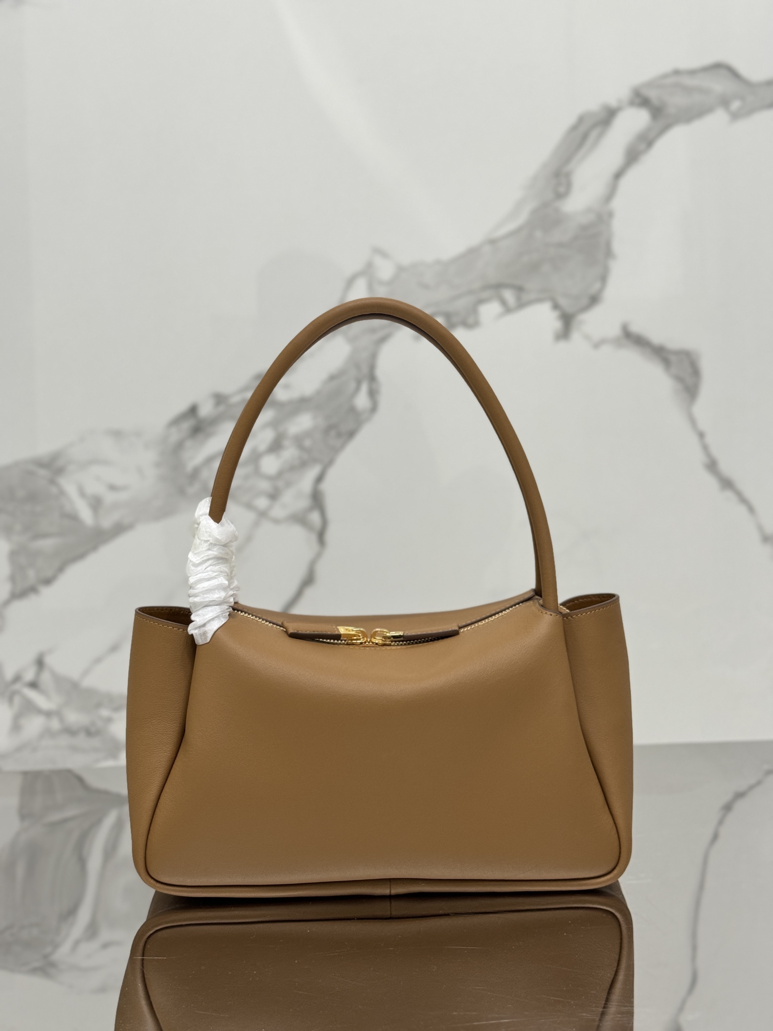 Leather handbag, imported calf leather, with imported lamb leather interior. Model No: 1BA444  