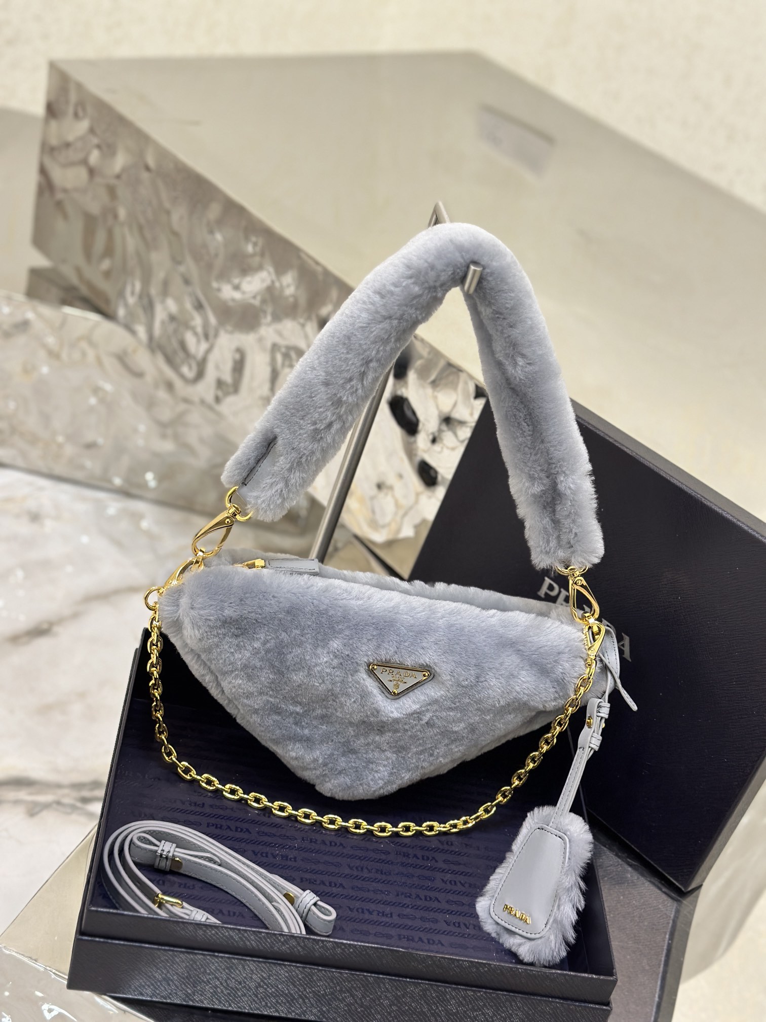 Triangle furry bag. Model No: 1BC543  