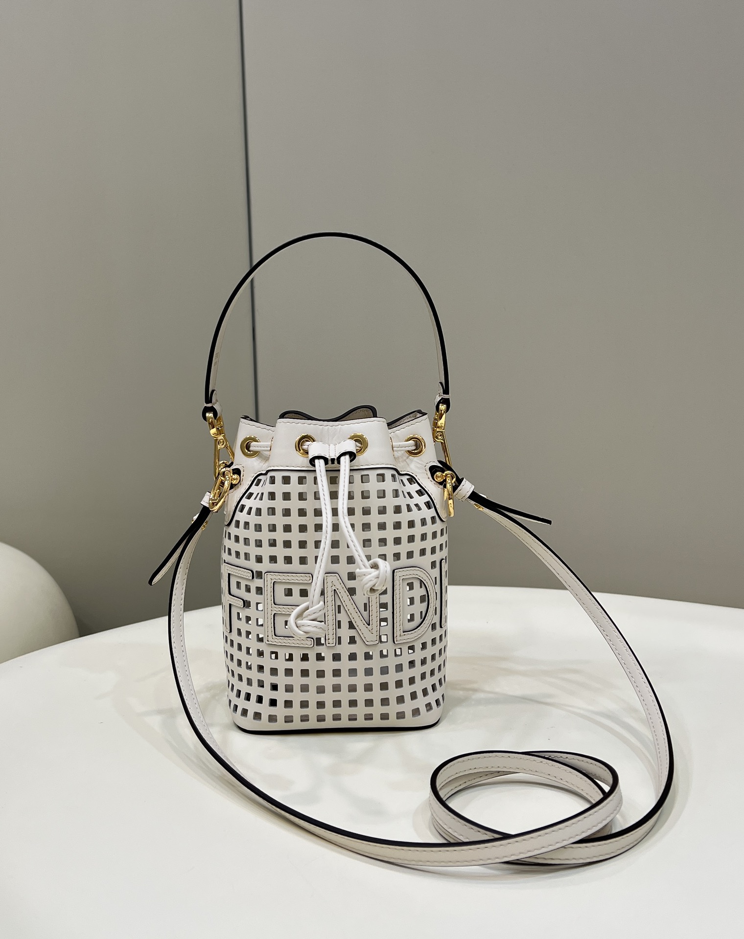 Gold Buckle Imported Calfskin Hollow-out Small Bucket Bag Model no: 8576