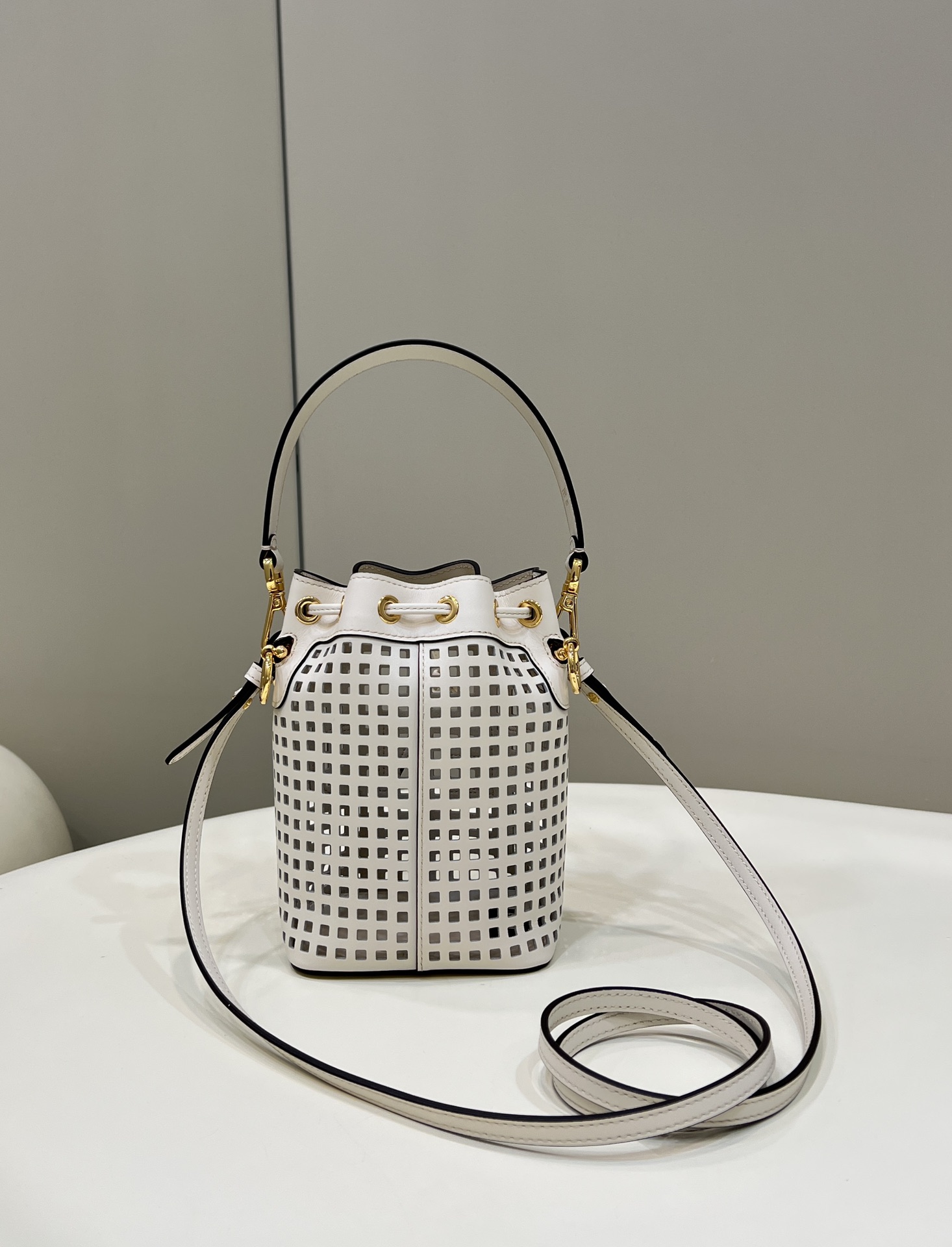 Gold Buckle Imported Calfskin Hollow-out Small Bucket Bag Model no: 8576