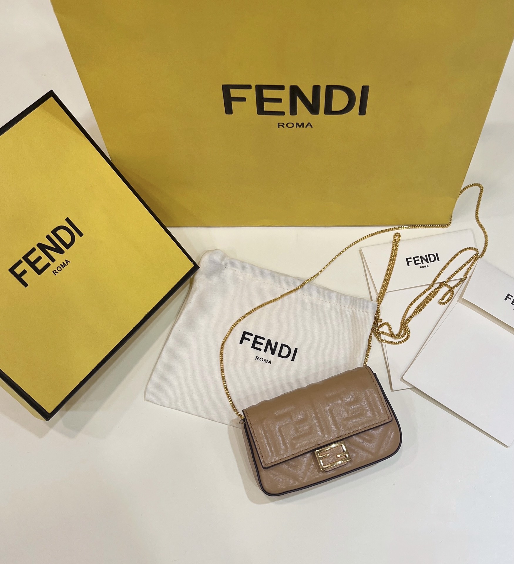 Fendi nano baguette, soft delicate lambskin with long chain shoulder strap Model no: 0136F