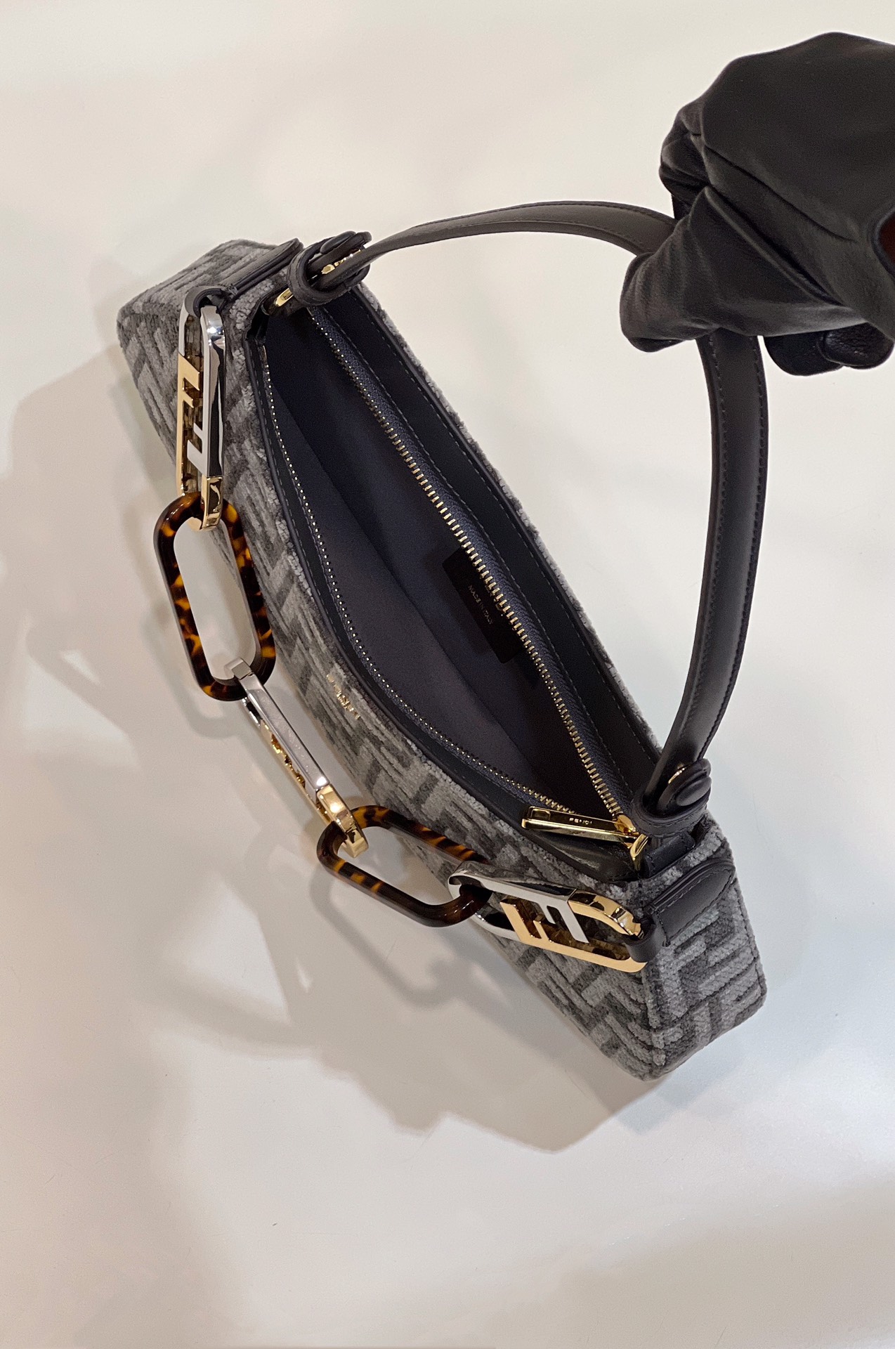 O'Lock clutch, mixed gold and silver with tortoiseshell effect organic glass chain decoration handle Model no: 8573A