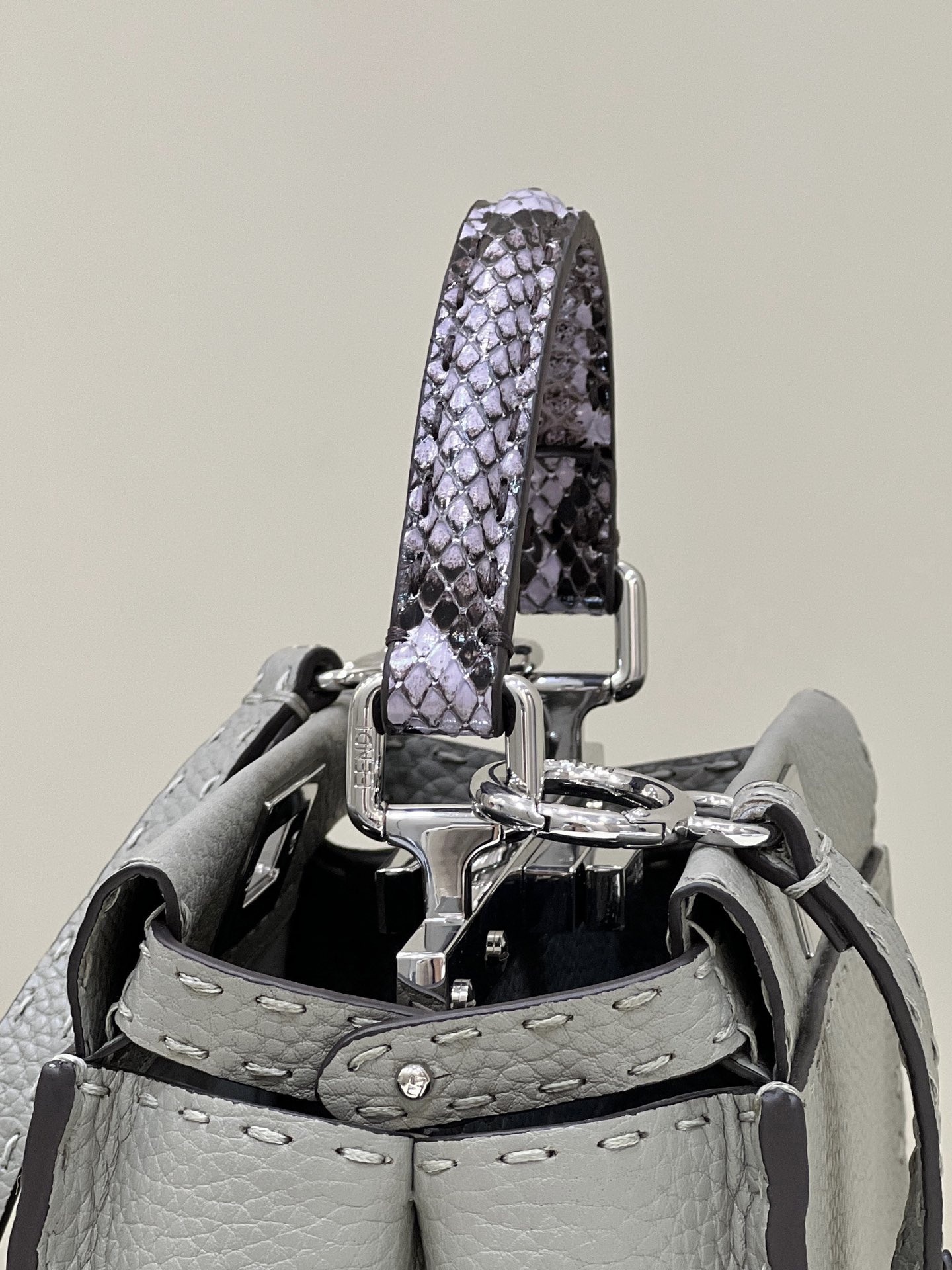 PEEKABOO handbag, hand-sewn exterior, all leather with snake skin wristlet Model no: 8551